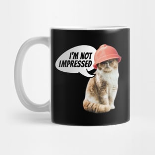 I'm not impressed. Cat with hard hat. Mug